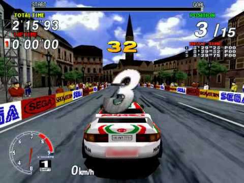 Rally car on a track with starting indicators in Sega Rally Championship.