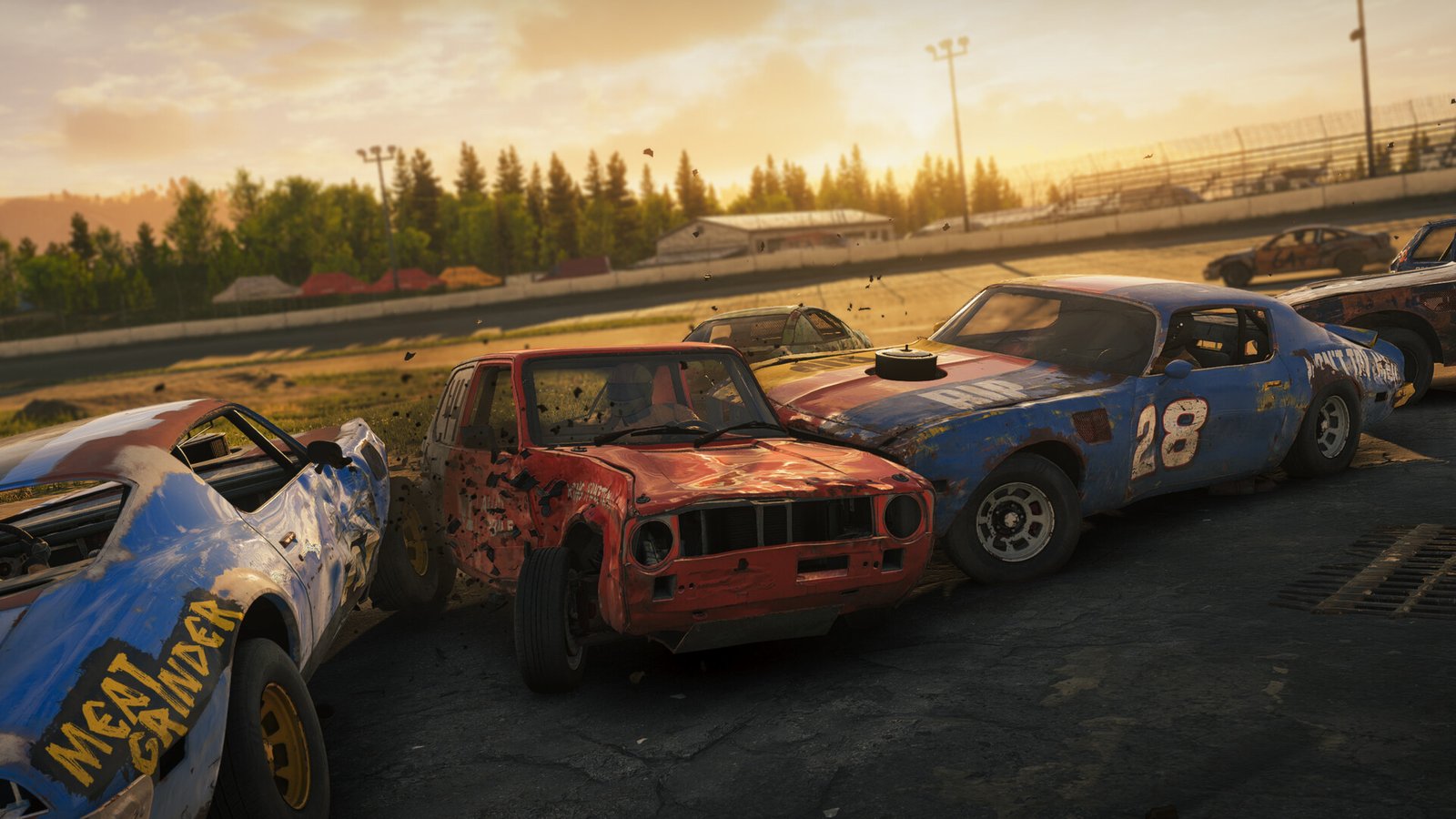 Damaged racing cars make contact while competing in Wreckfest 2.